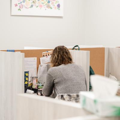PHWC - client working at desk